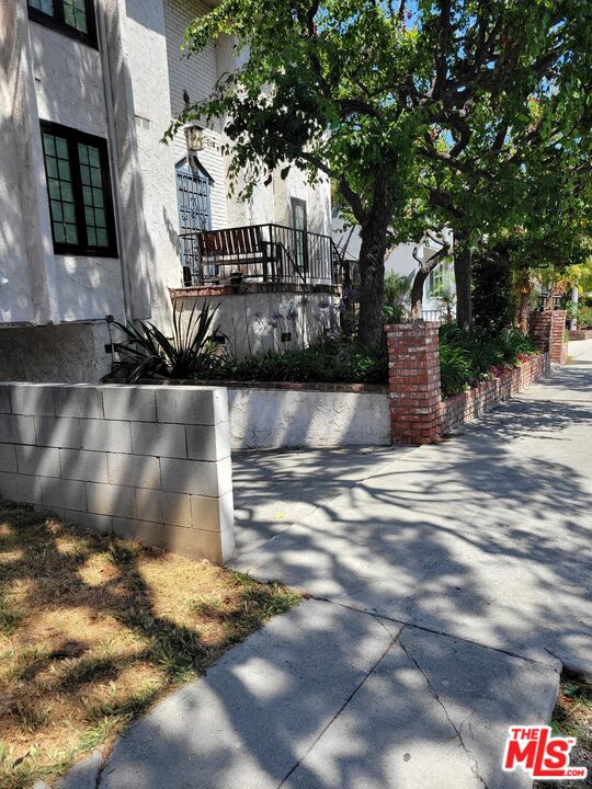 a view of a street with houses