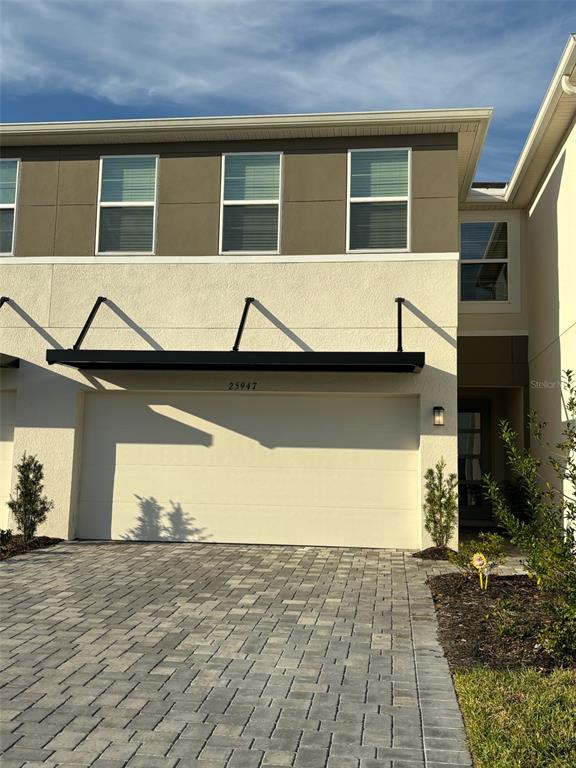 a house view with a outdoor space