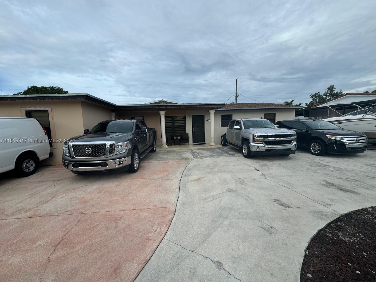 a car parked in front of a house