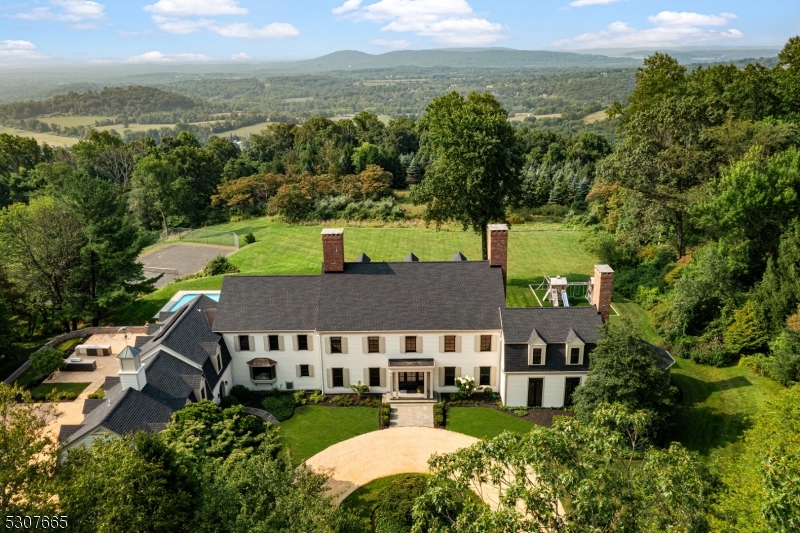 aerial view of a house with a garden