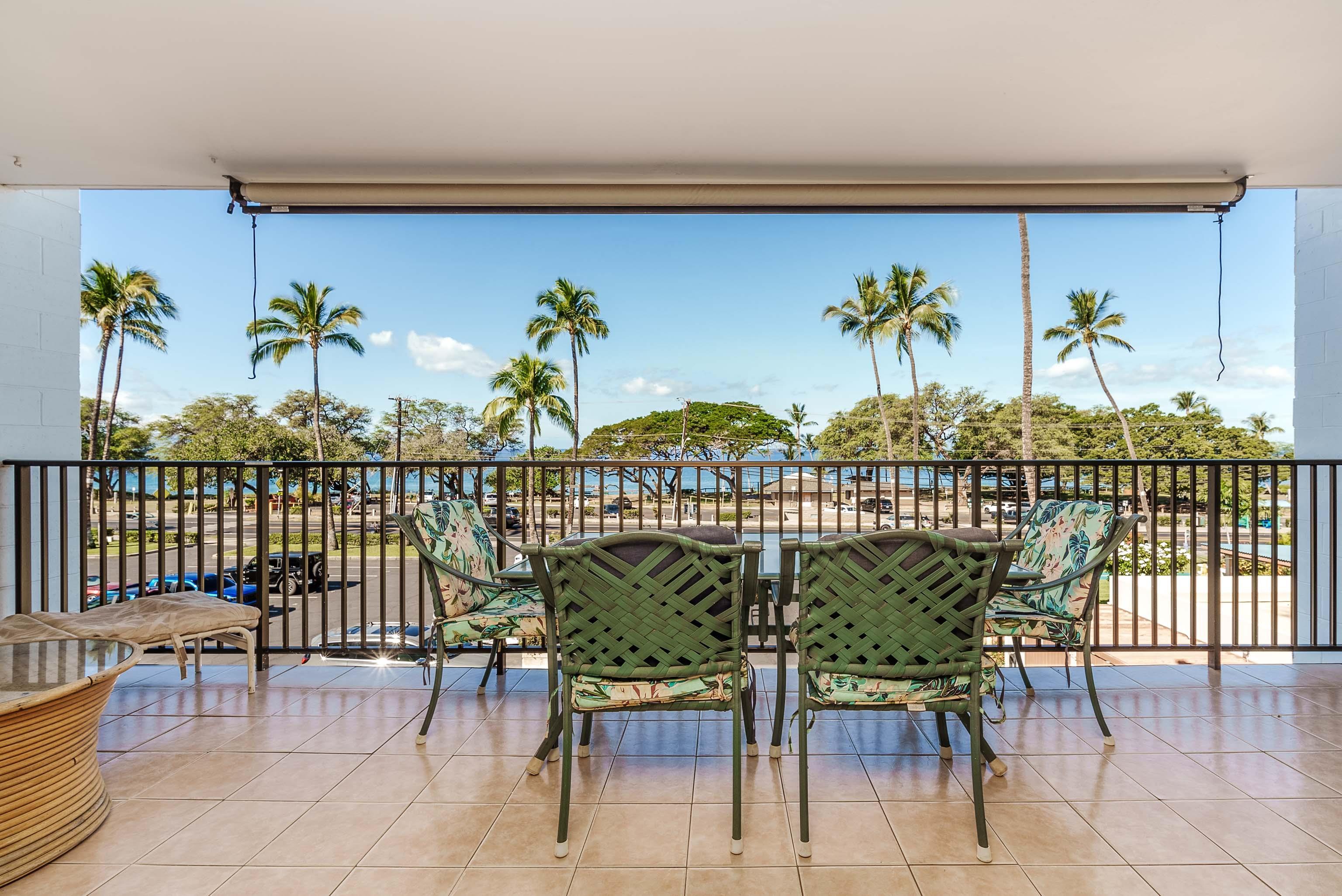 a view of a chairs and table in patio