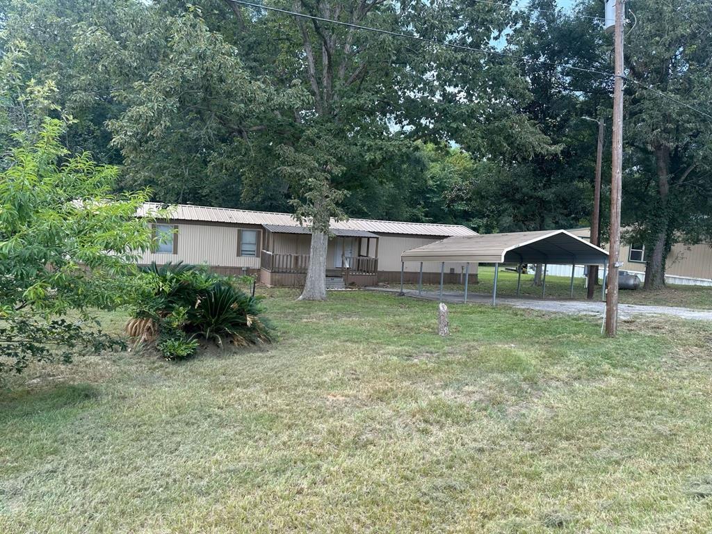 a house view with a garden space