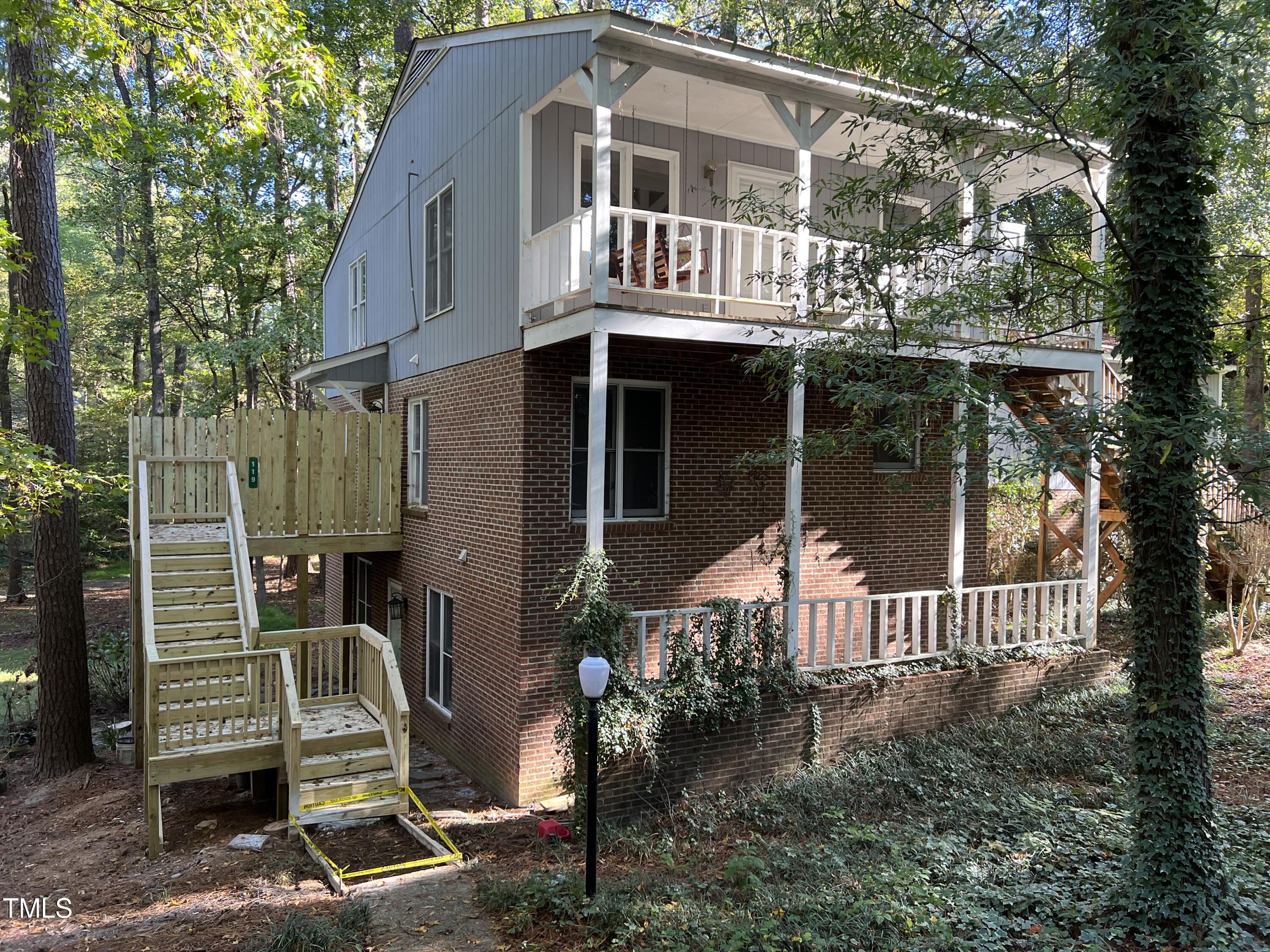 a front view of a house with a porch