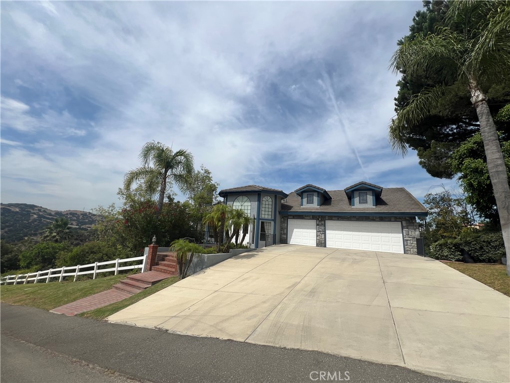 a house with trees in the background