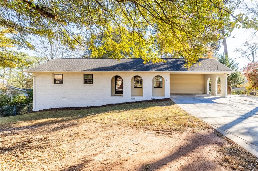 front view of a house with a big yard