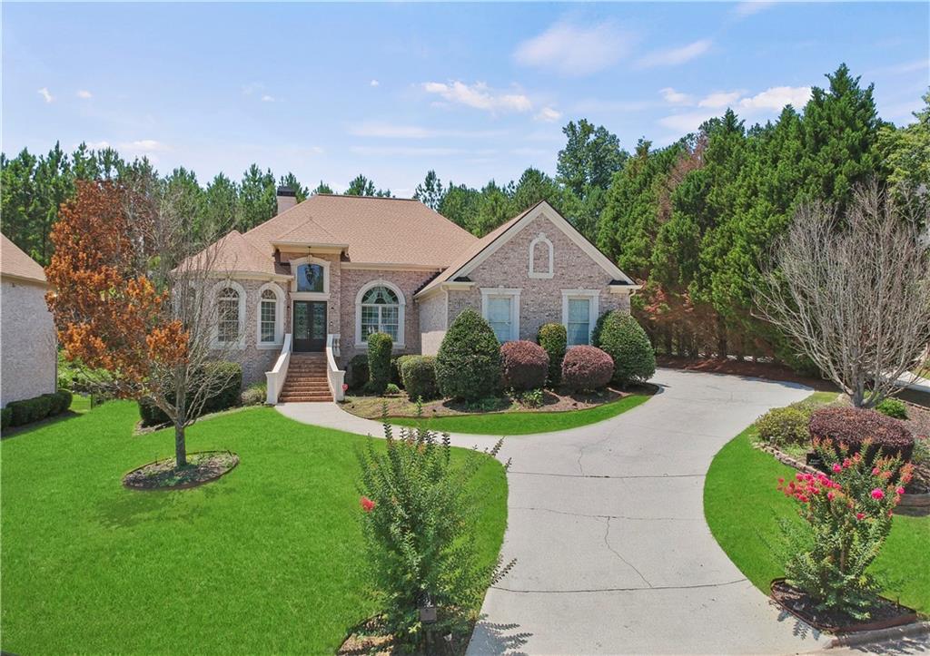 a view of a house with a garden