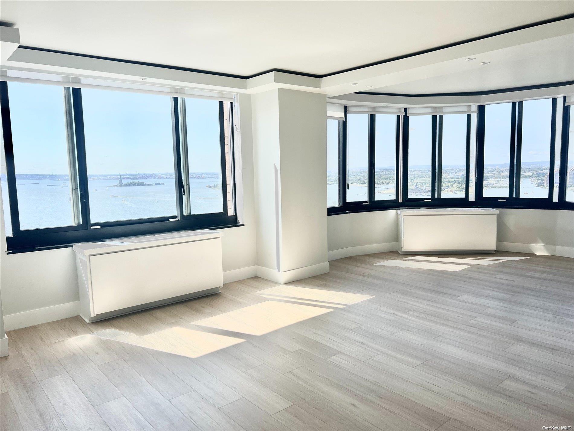 a view of a large window with wooden floor