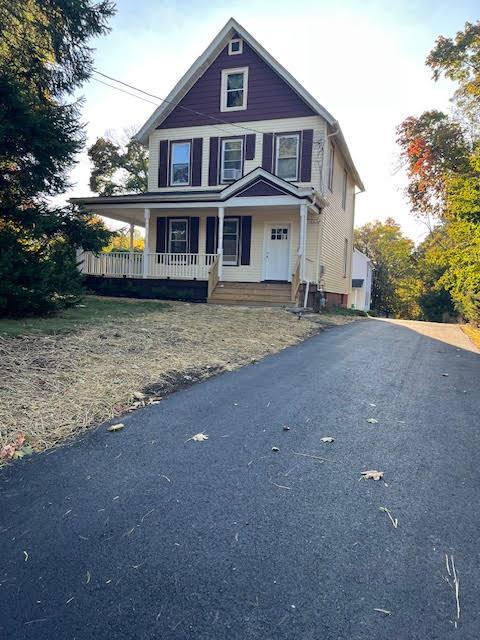 View of front of property featuring a porch