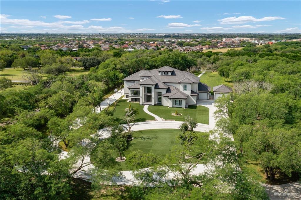 an aerial view of a house with a garden