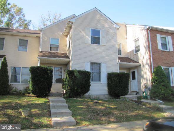 a front view of house with yard