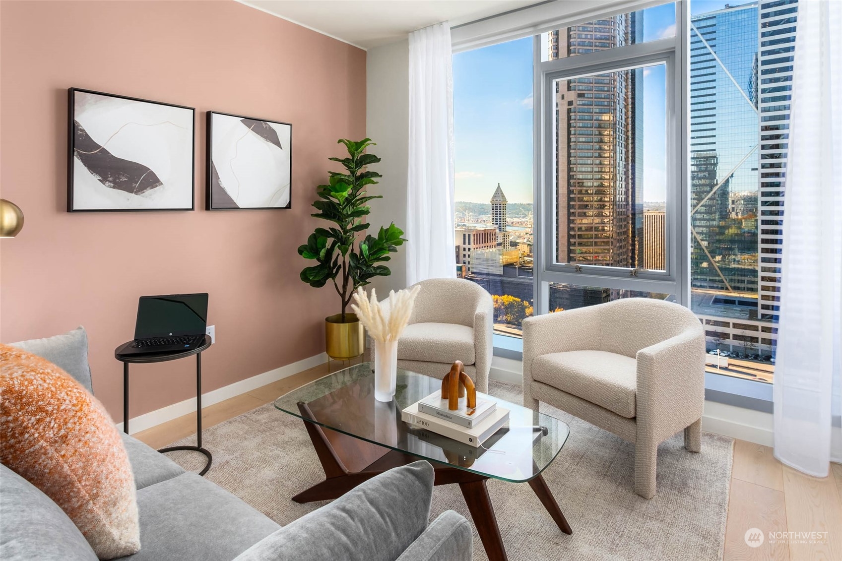 a living room with furniture and a large window