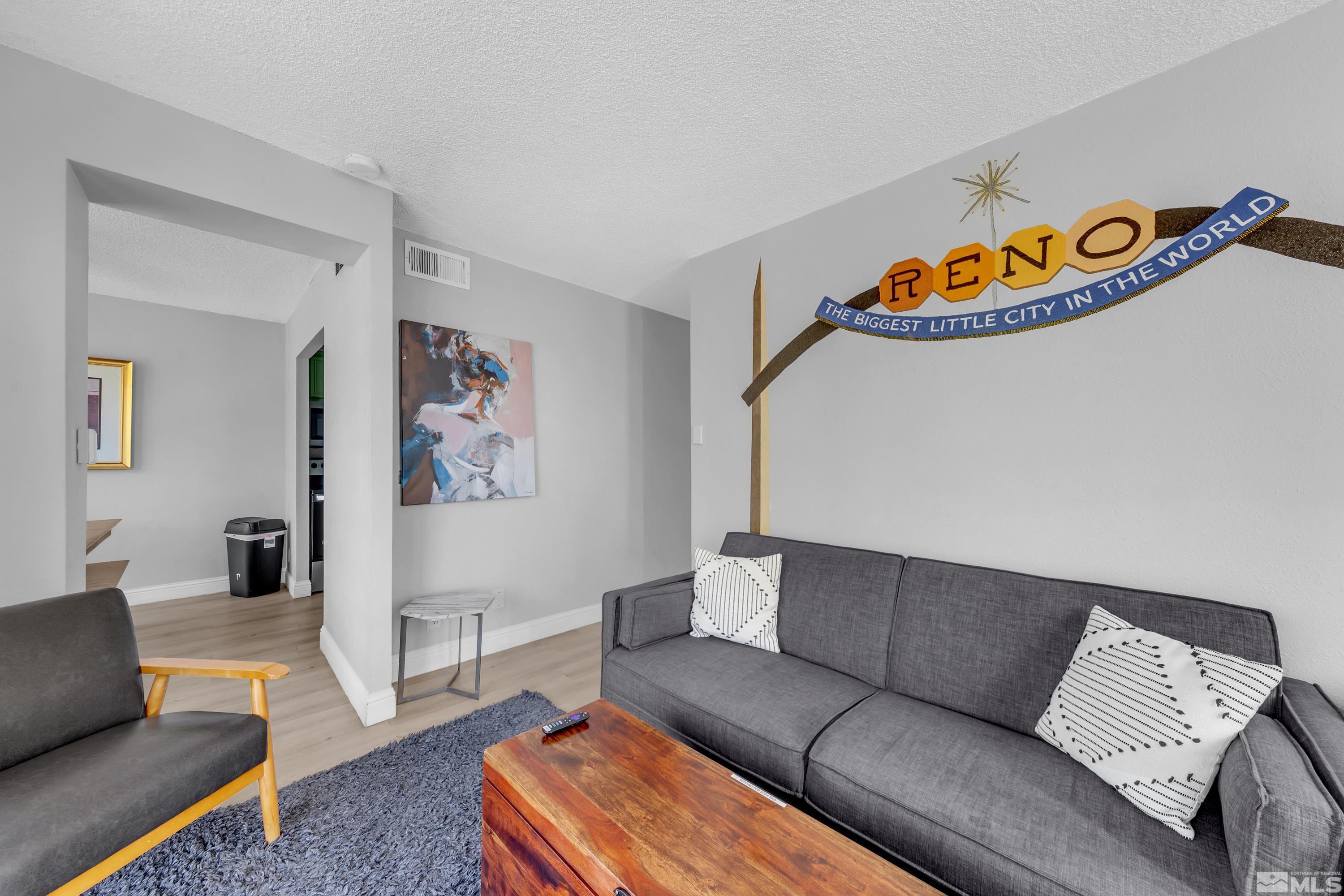 a living room with furniture and a couch