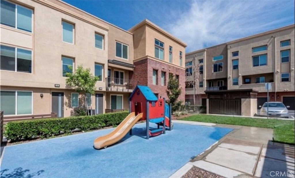 a front view of building with outdoor space