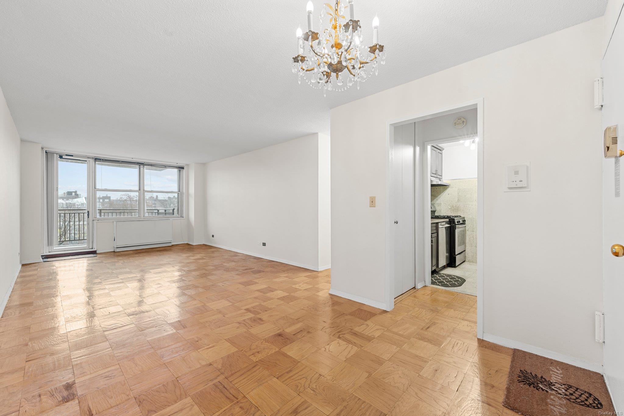 a view of an empty room with a window