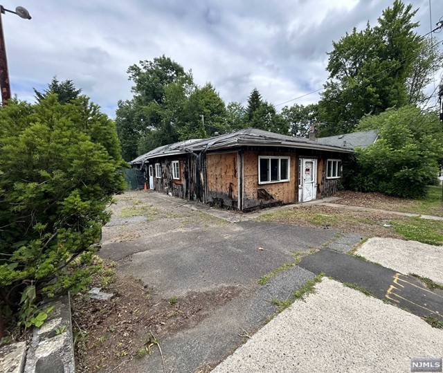 a house with trees in the background