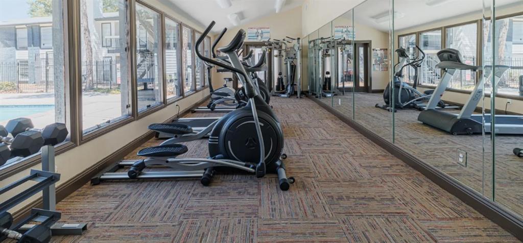 a view of a room with gym equipment