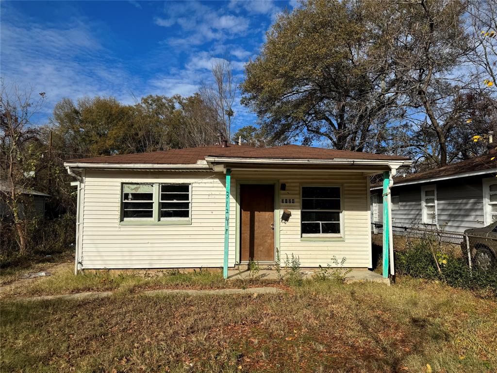 a front view of a house with a garage