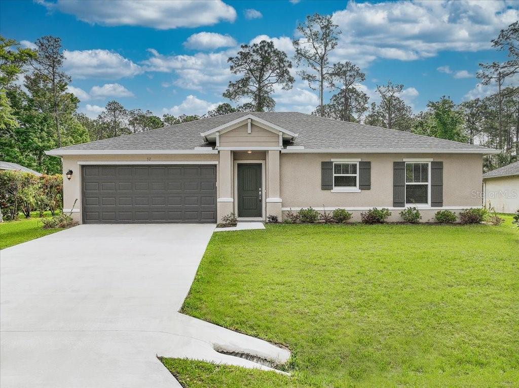 front view of house with a yard