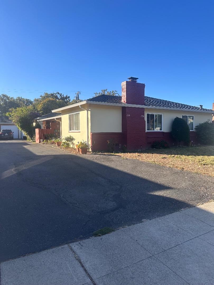 front view of house with a yard