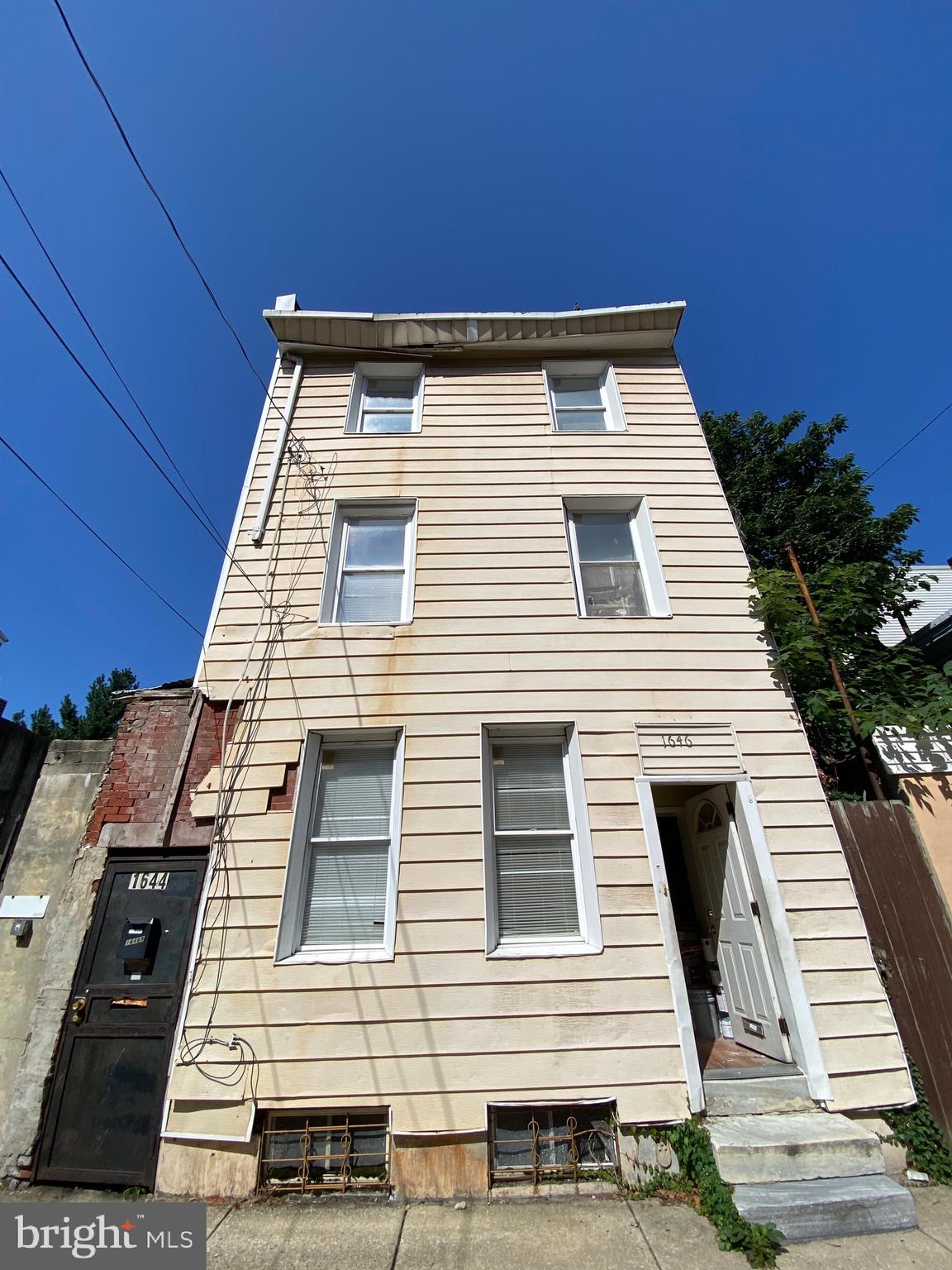 a view of a house with a roof deck