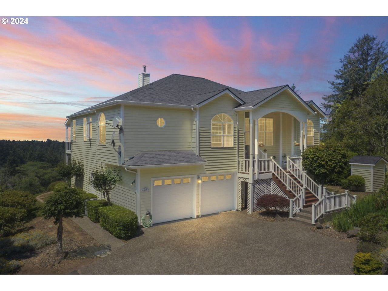 a front view of a house with a yard