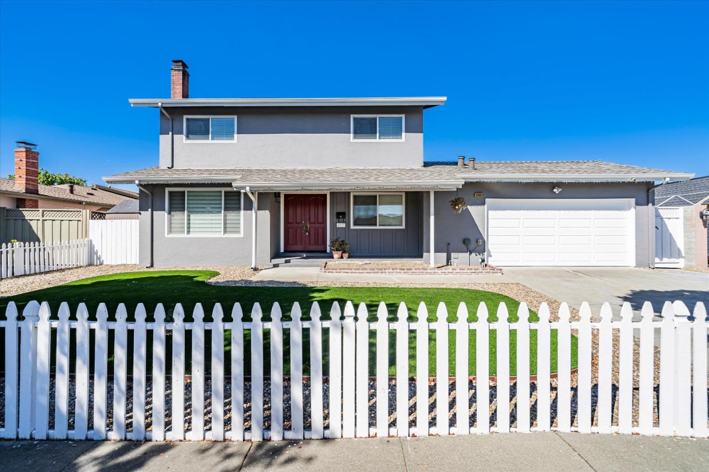 a front view of a house with a porch