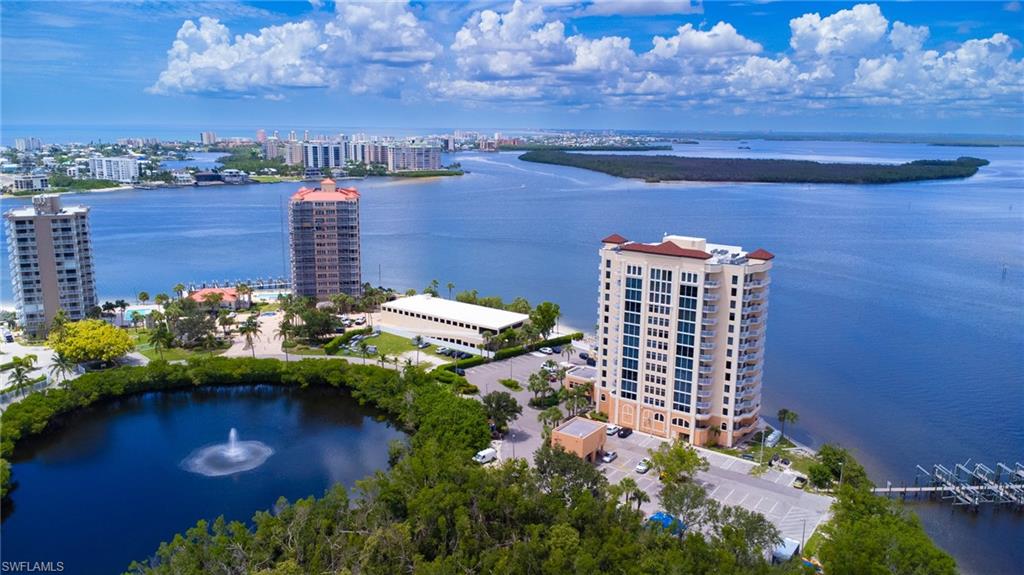 a view of a lake with a building in the background