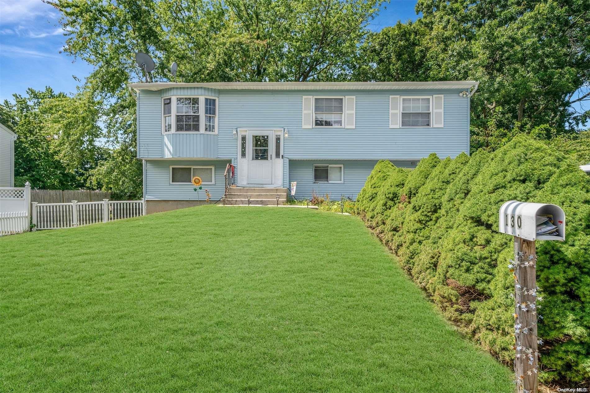 a house view with a garden space