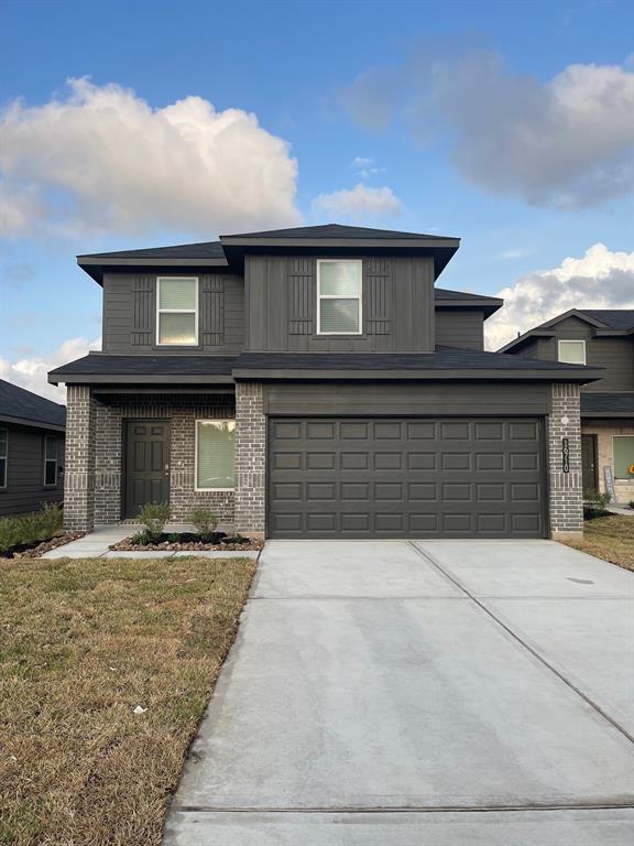 a front view of a house with yard