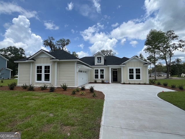 a front view of a house with yard