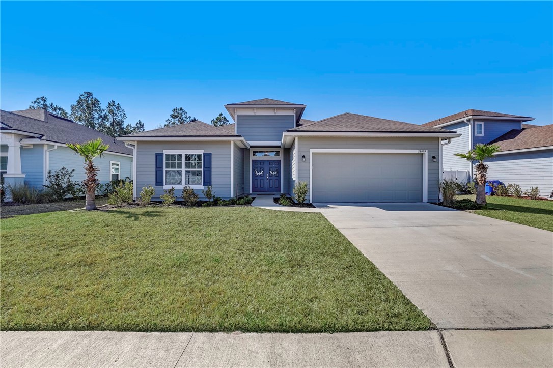 front view of a house with a yard