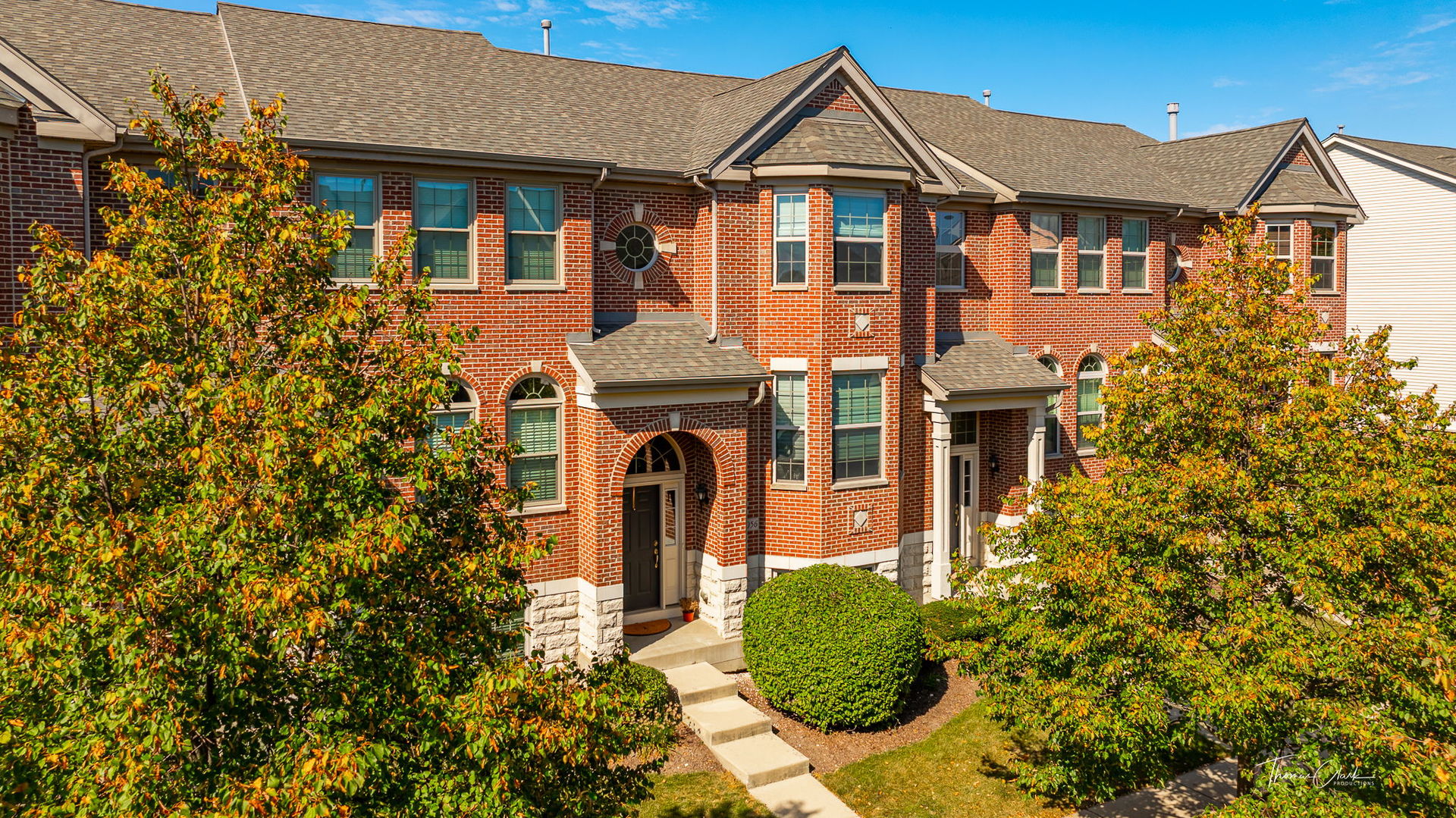 front view of a house with a yard