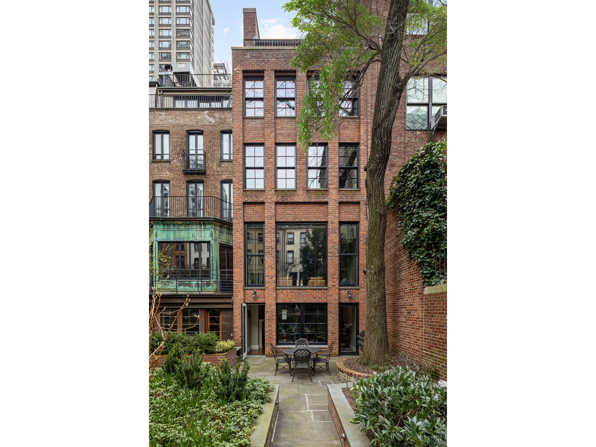 a couple of potted plants and a building view