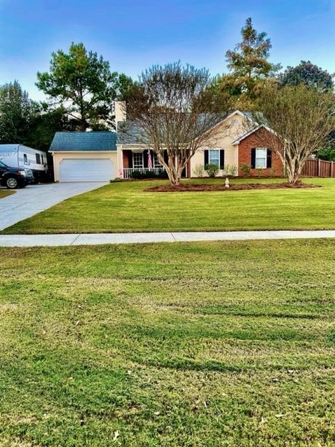 a house view with a garden space