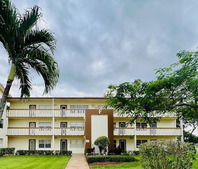 a view of a building with a garden