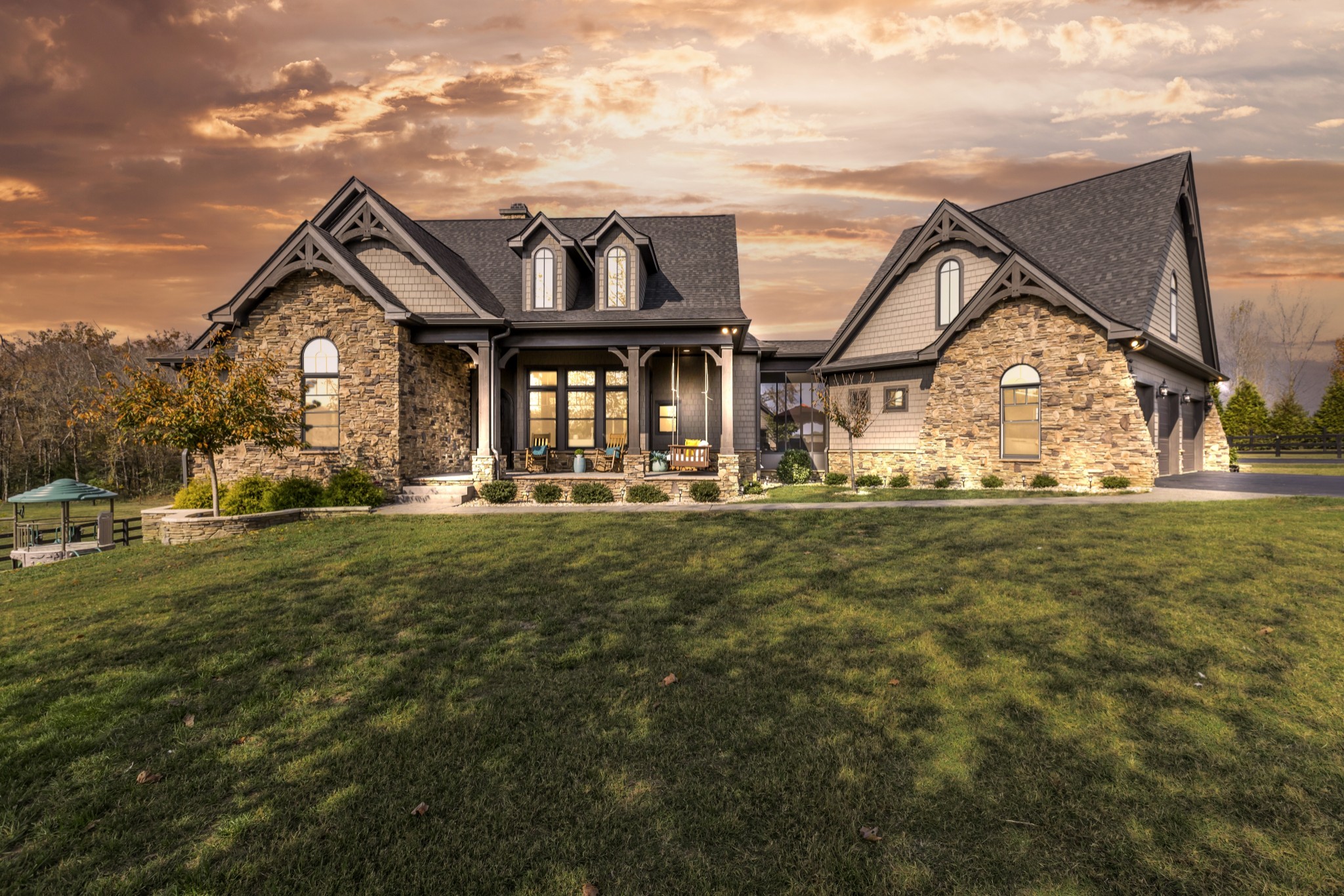 a front view of a house with a yard