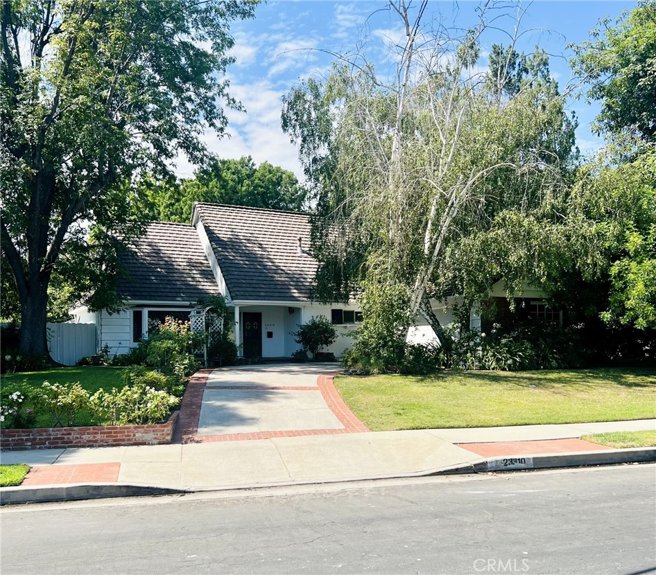 a view of a house with a swimming pool