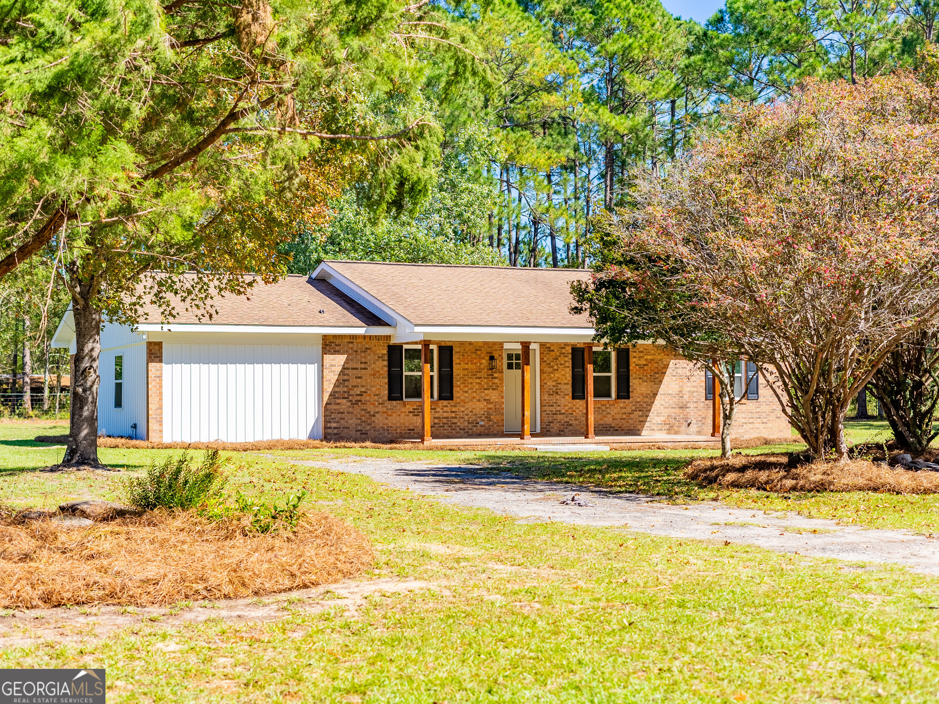 a house with trees in front of it