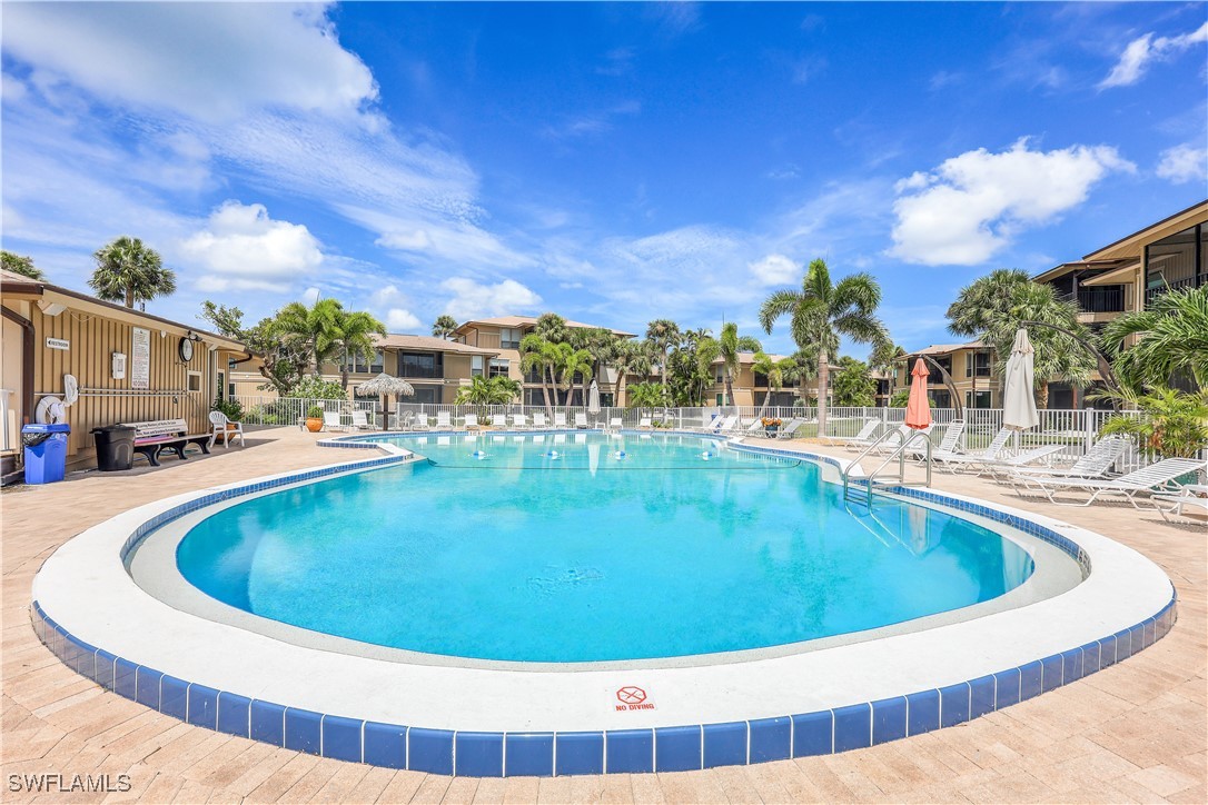 a view of outdoor space yard swimming pool and outdoor seating