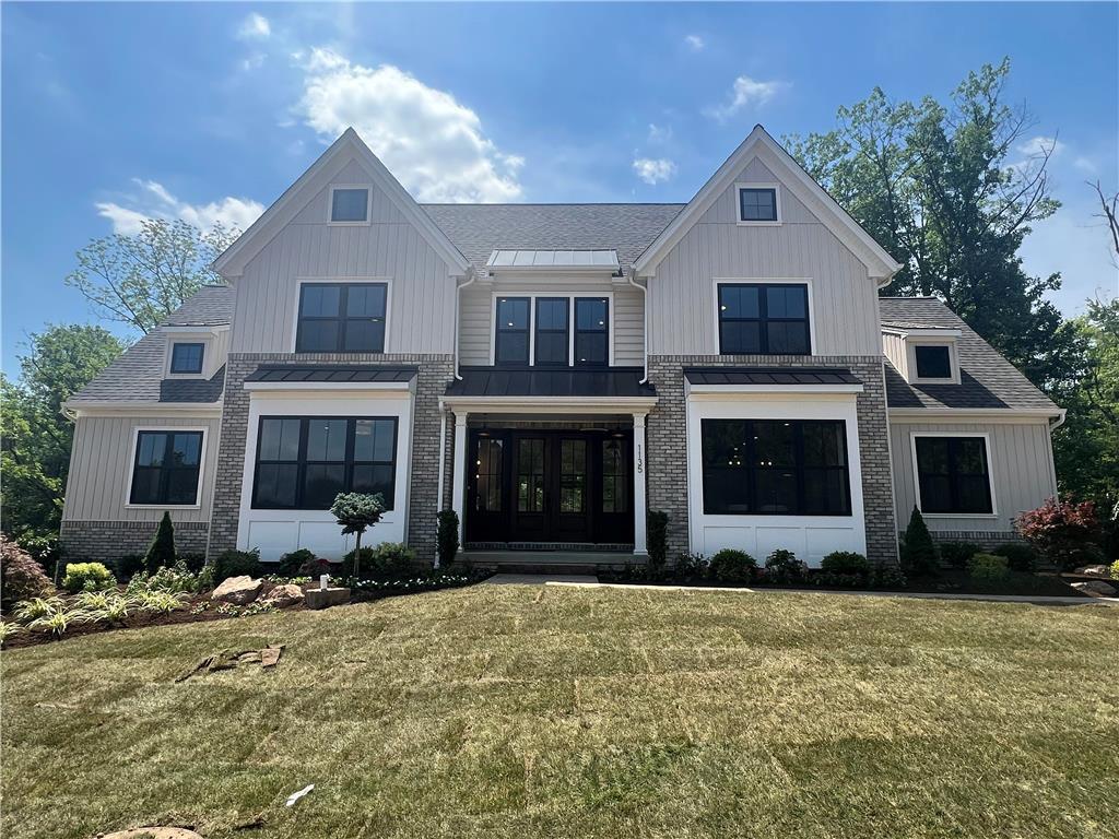 a front view of house with yard