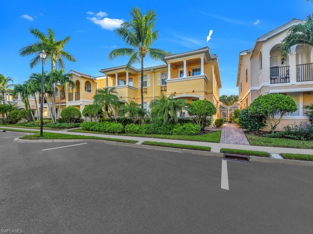 View of front of home with a balcony