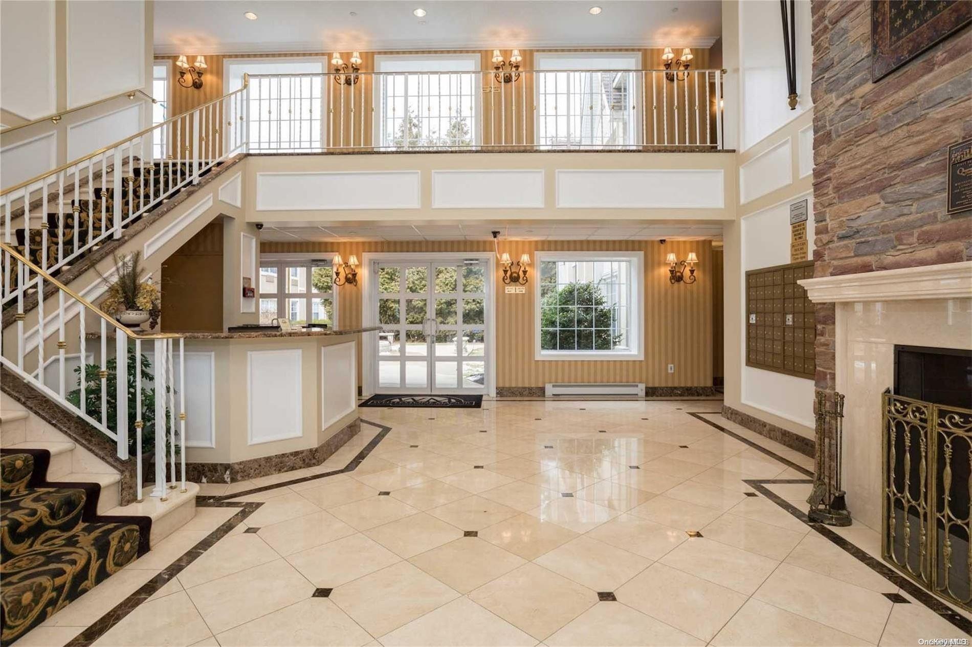 a view of front door of house with stairs