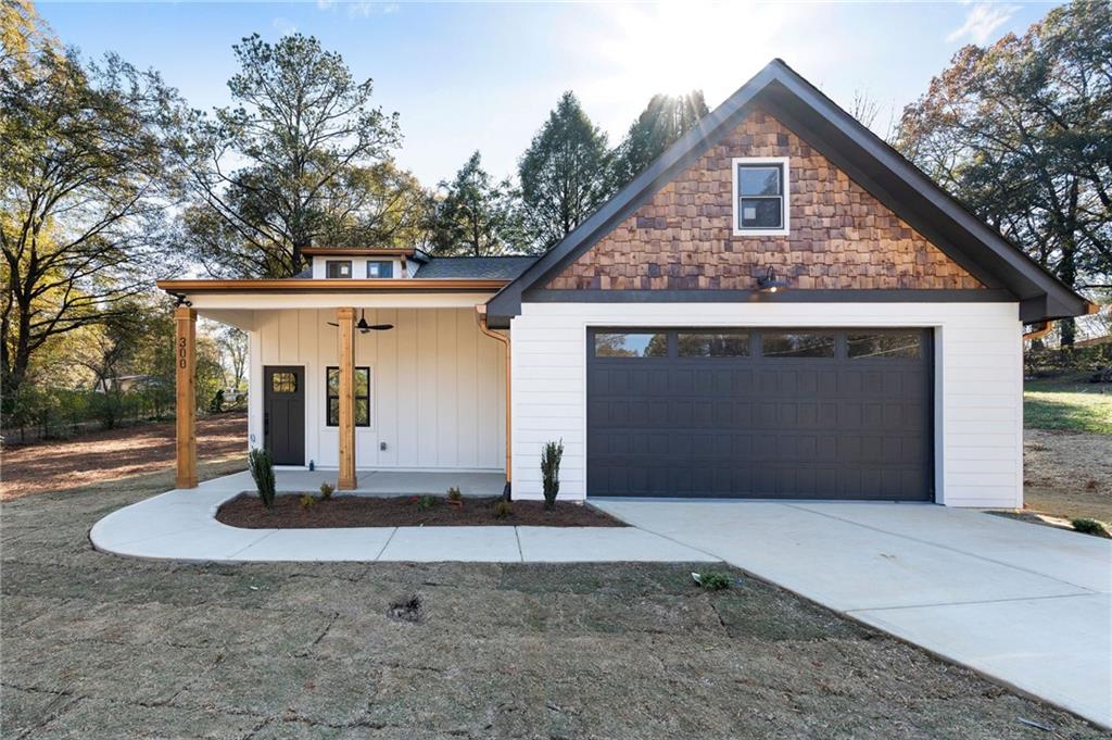 a front view of a house with a garage