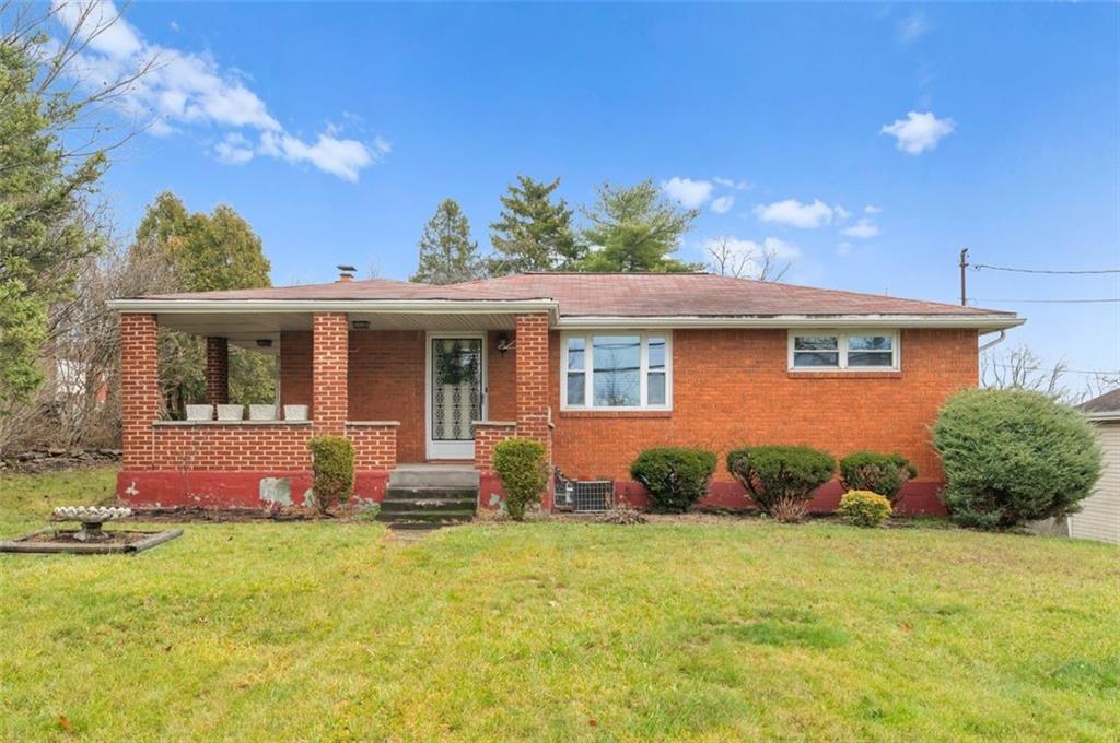 front view of a house with yard