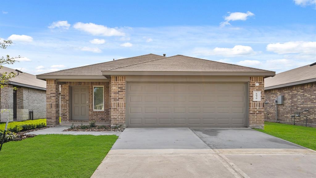 front view of house with a yard