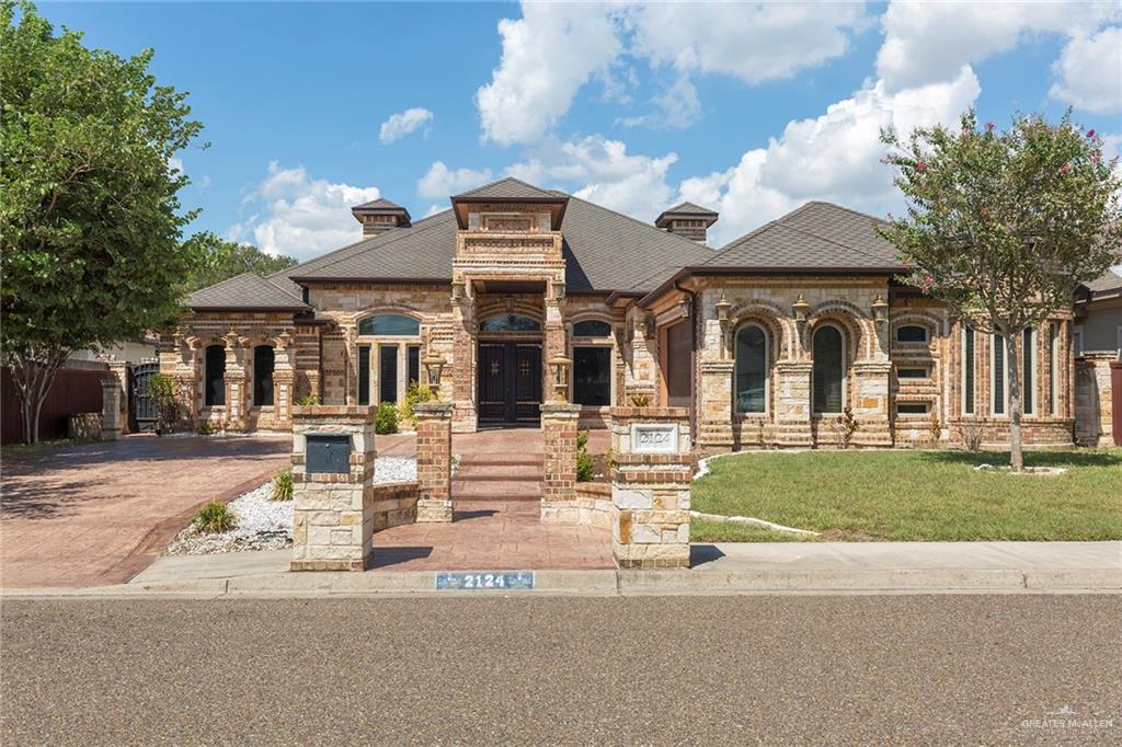 front view of a house with a patio