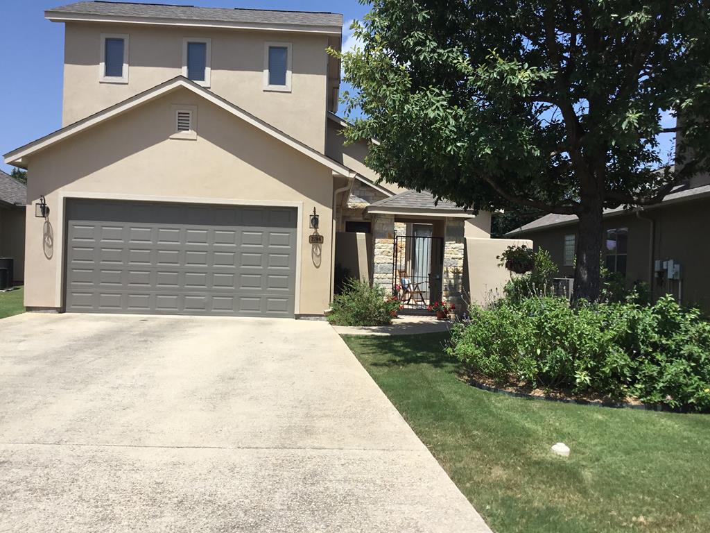 front view of house with a yard