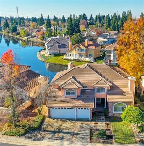 a aerial view of a house with a ocean view