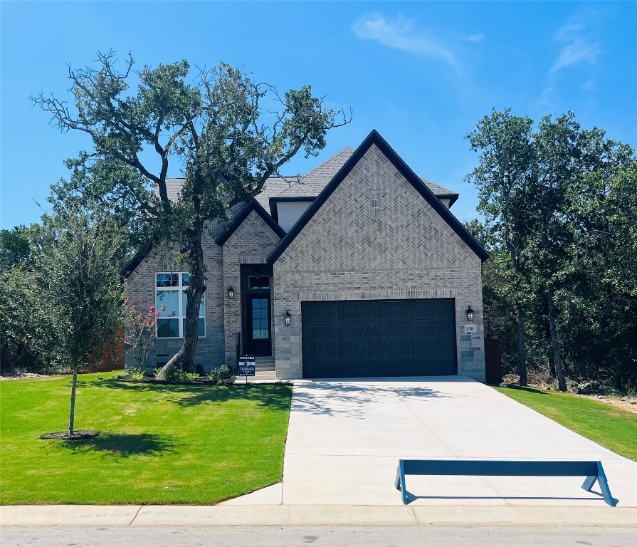 a front view of house with yard