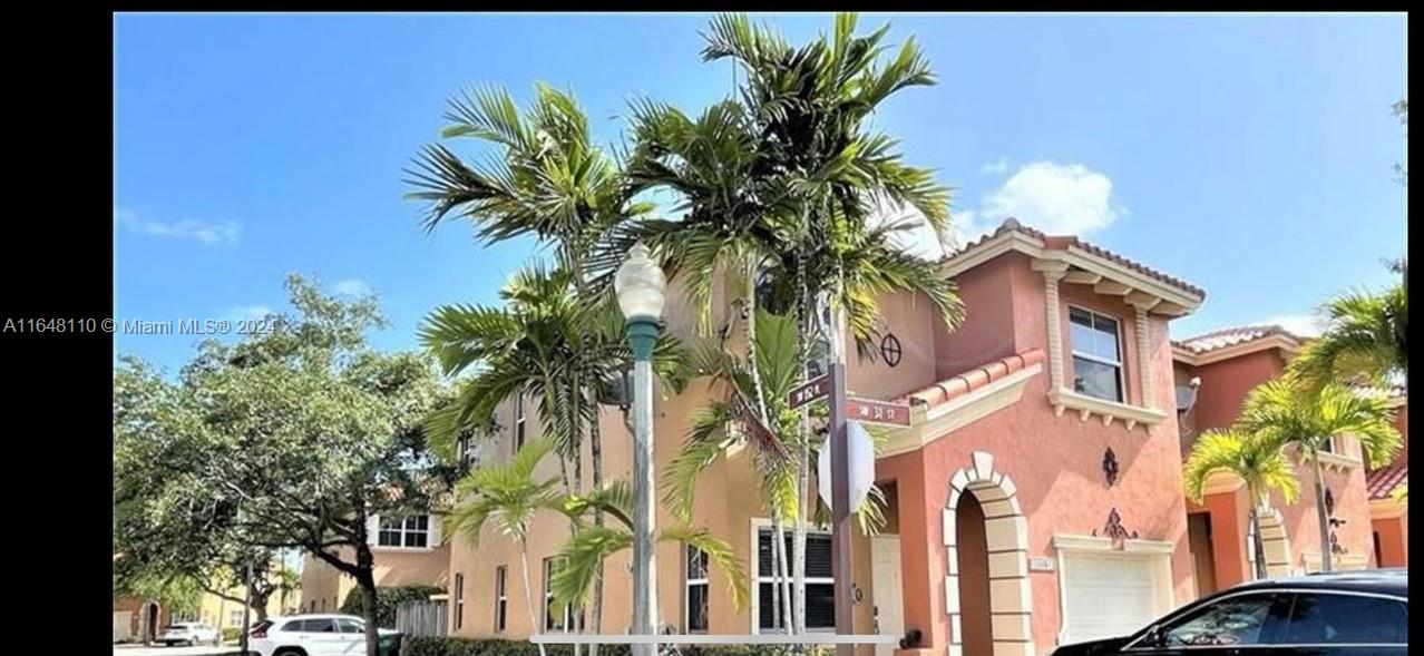 a plant that is in front of a building